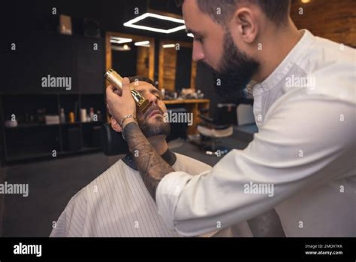 Can a barber work in a hair salon?