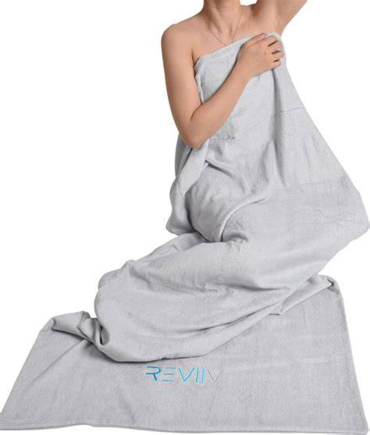 Can I wear a towel in the sauna?