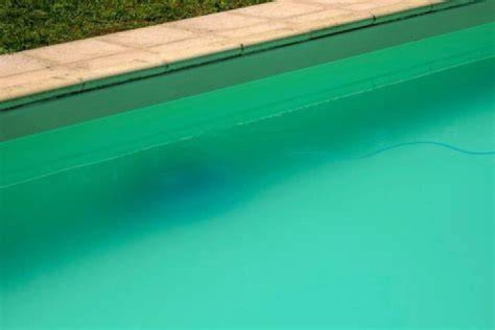 Can too much shock make a pool cloudy?