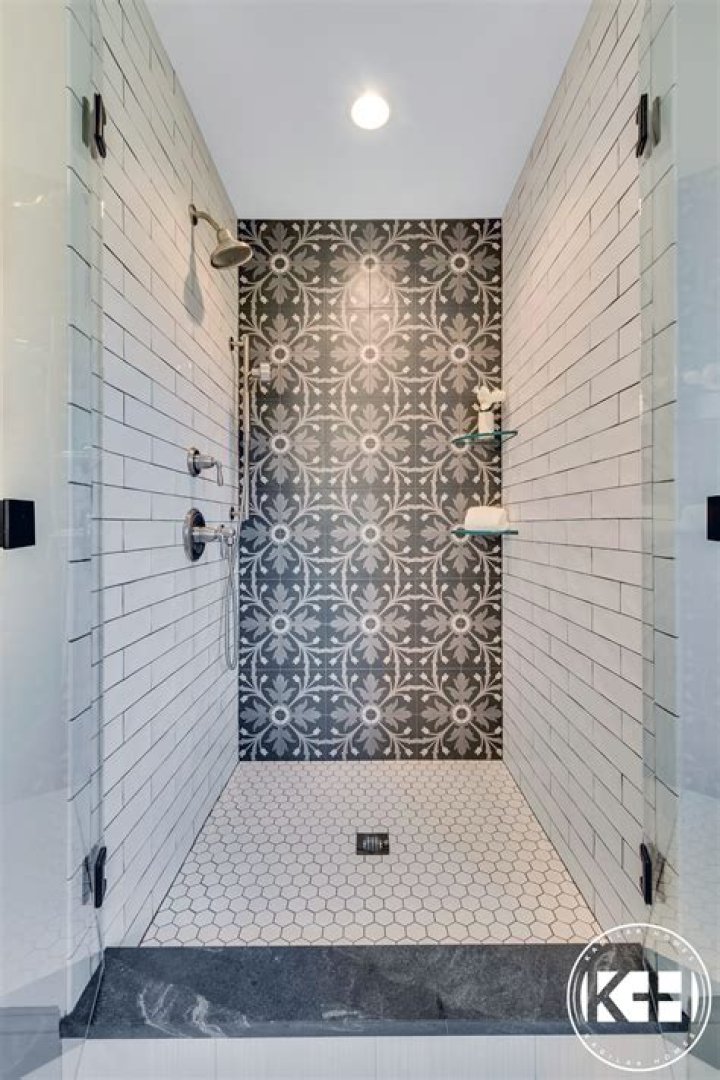 Can you use floor tiles on shower walls?