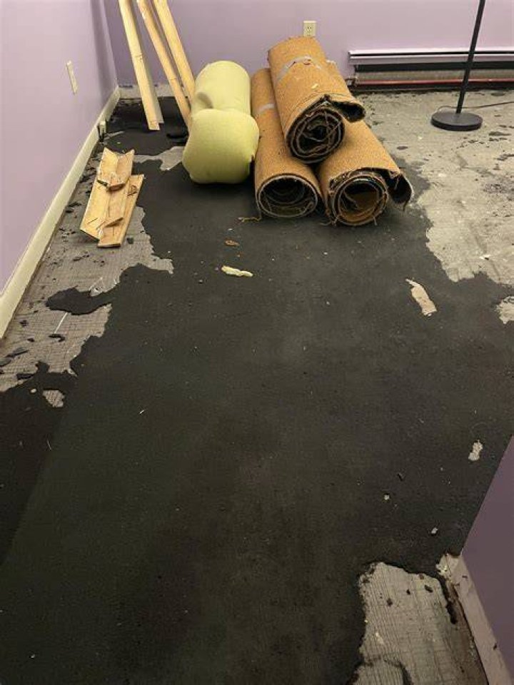 Do you glue carpet pad to concrete?