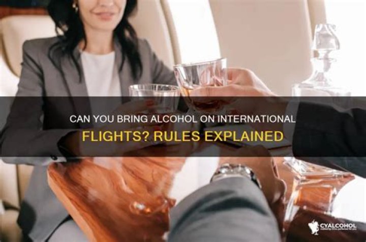 Does Air Asia serve alcohol on international flights?