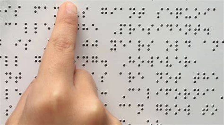 How do blind people read Braille script?