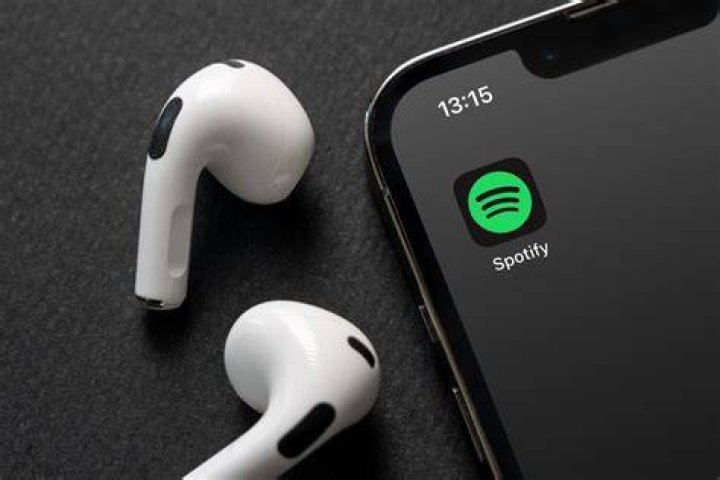 How do I add music from Spotify to my Apple Watch?