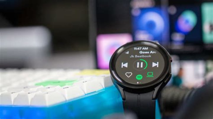 How do I download music to my Samsung watch?