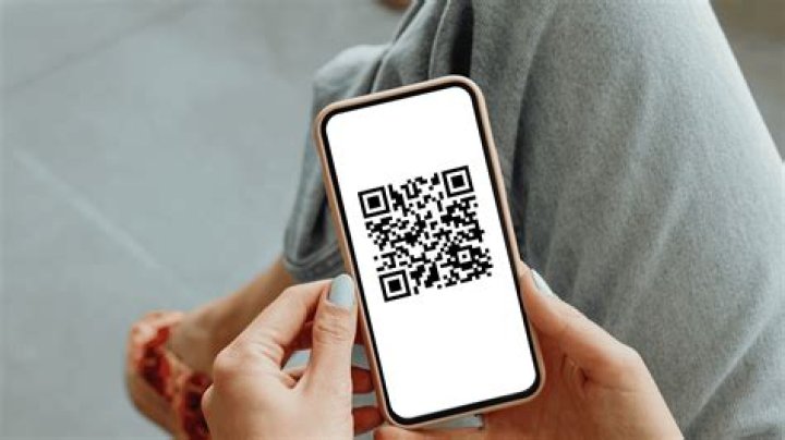 How do I redeem a digital code on my iPhone?