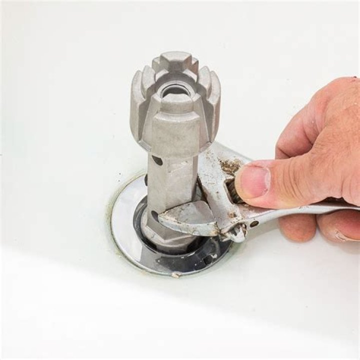 How do I remove a stripped bathtub drain?