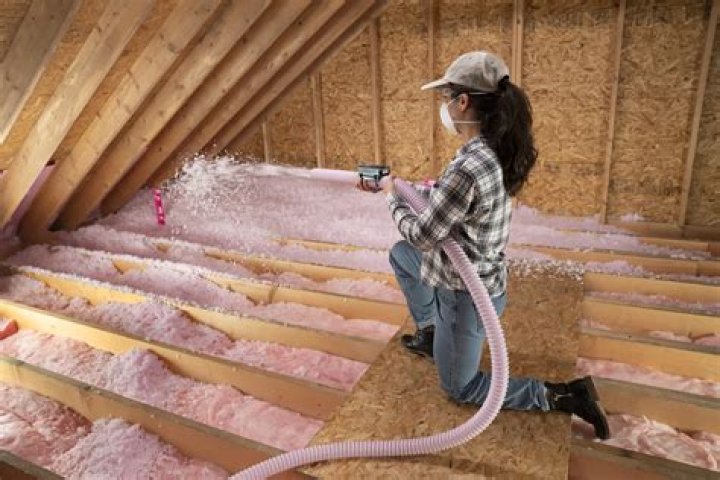 How do I roll insulation in my attic?
