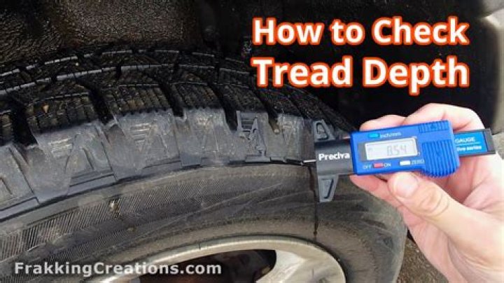 How do you check the tread depth on a semi tire?