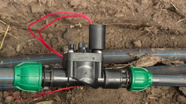 How do you check the water pressure on an irrigation system?