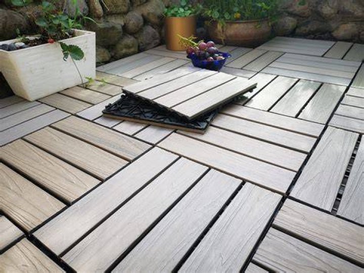 How do you clean deck tiles?