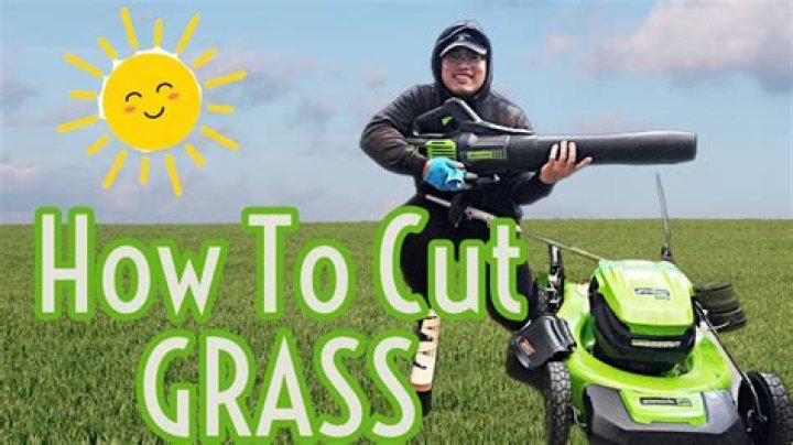 How do you cut grass by hand?