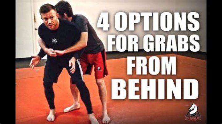 How do you defend yourself if someone grabs you from behind?