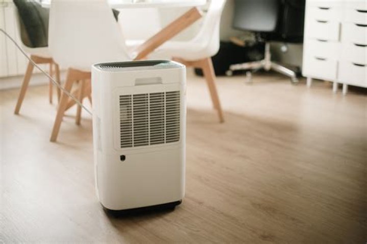 How do you dehumidify a room with AC?