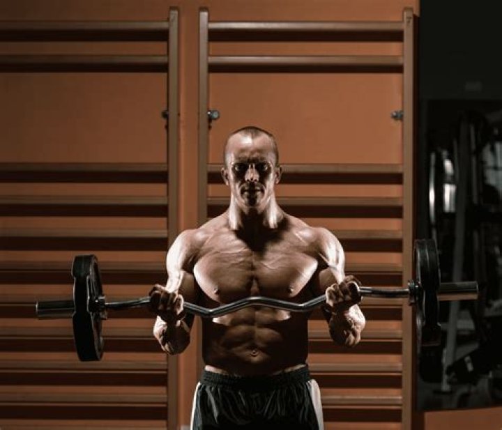 How do you do a bicep curl bar?