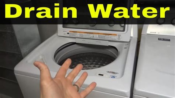 How do you drain water from a portable washing machine?