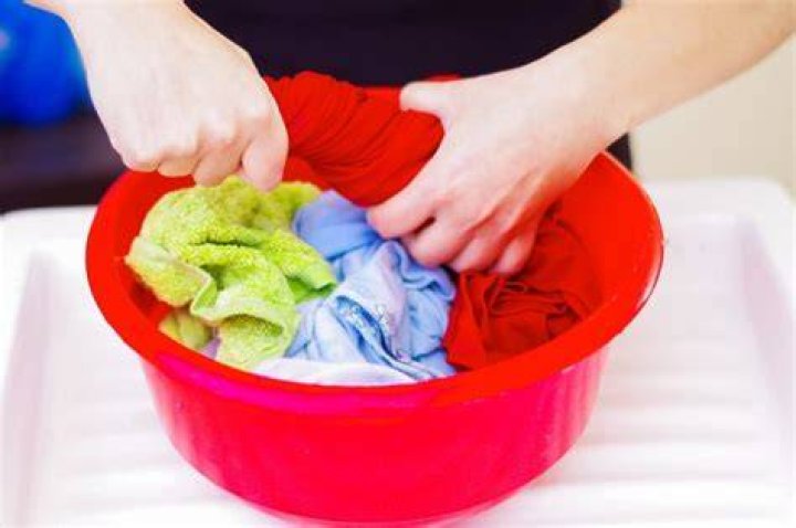 How do you dry hand washed clothes quickly?