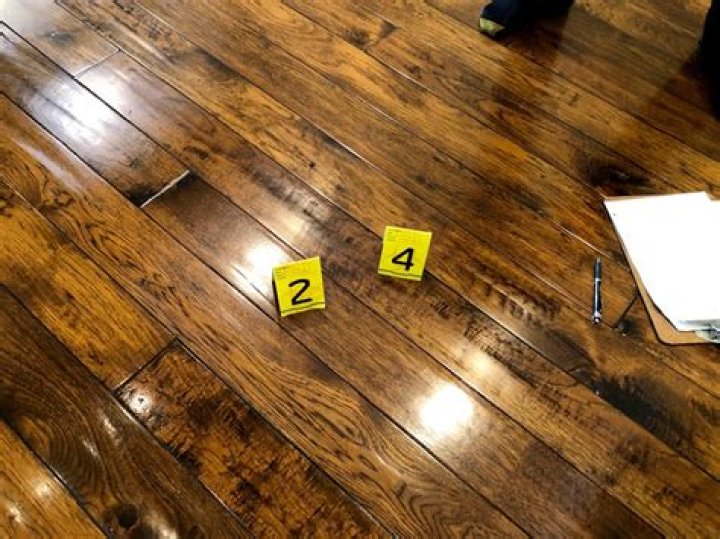 How do you get rid of slick spots on hardwood floors?