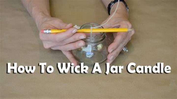 How do you get the wick out of a candle jar?