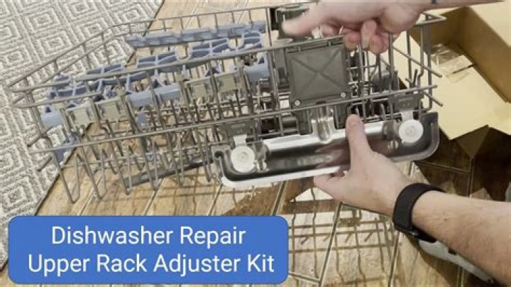How do you lower the top of a dishwasher rack?