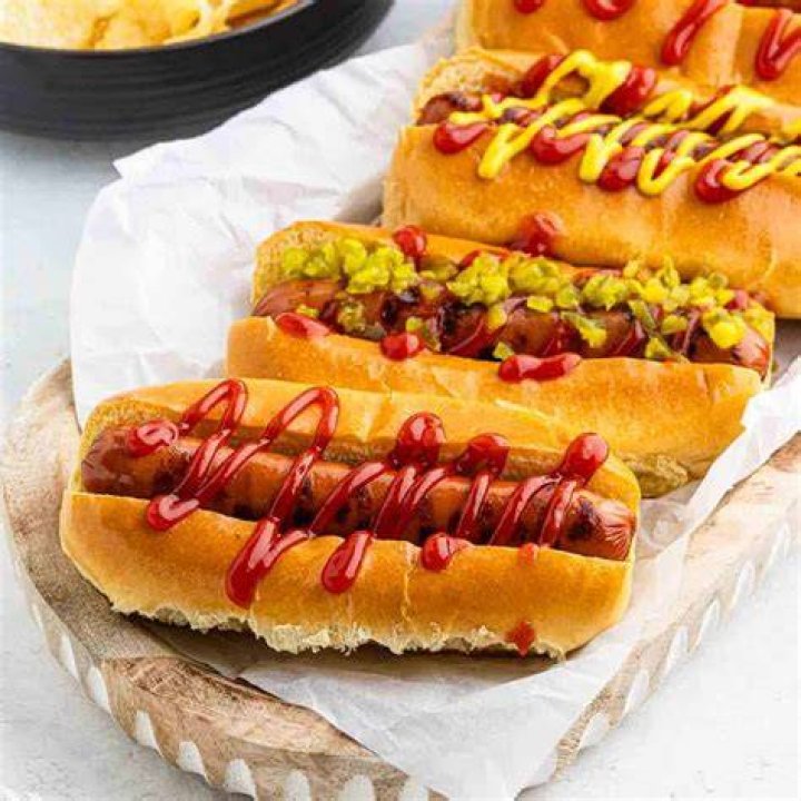 How do you reheat a grilled hot dog?
