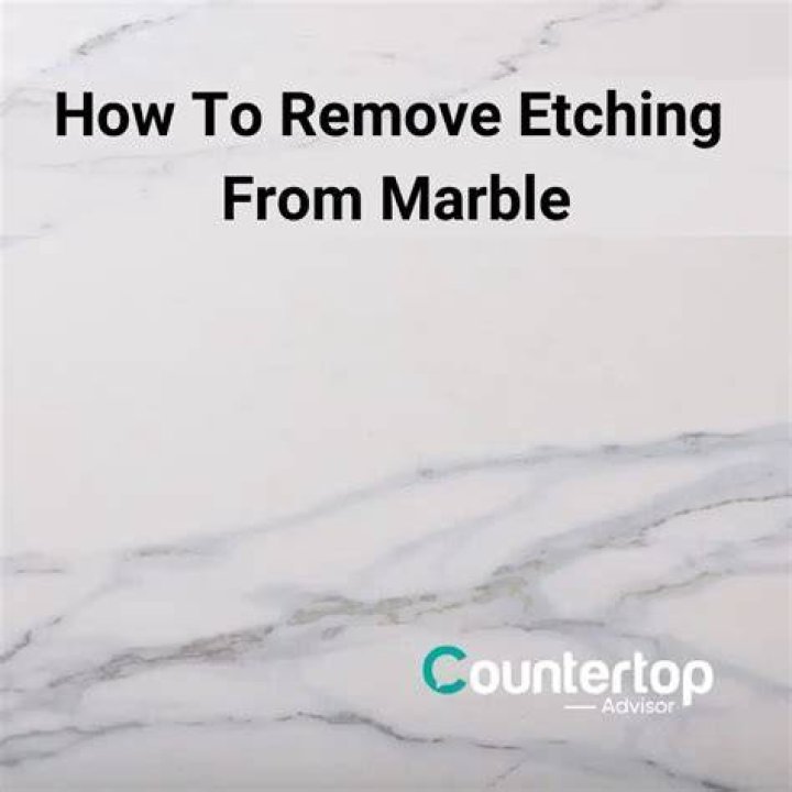 How do you remove etching from black marble?