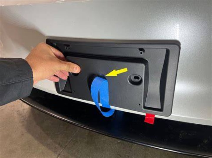 How do you remove front license plate bracket?