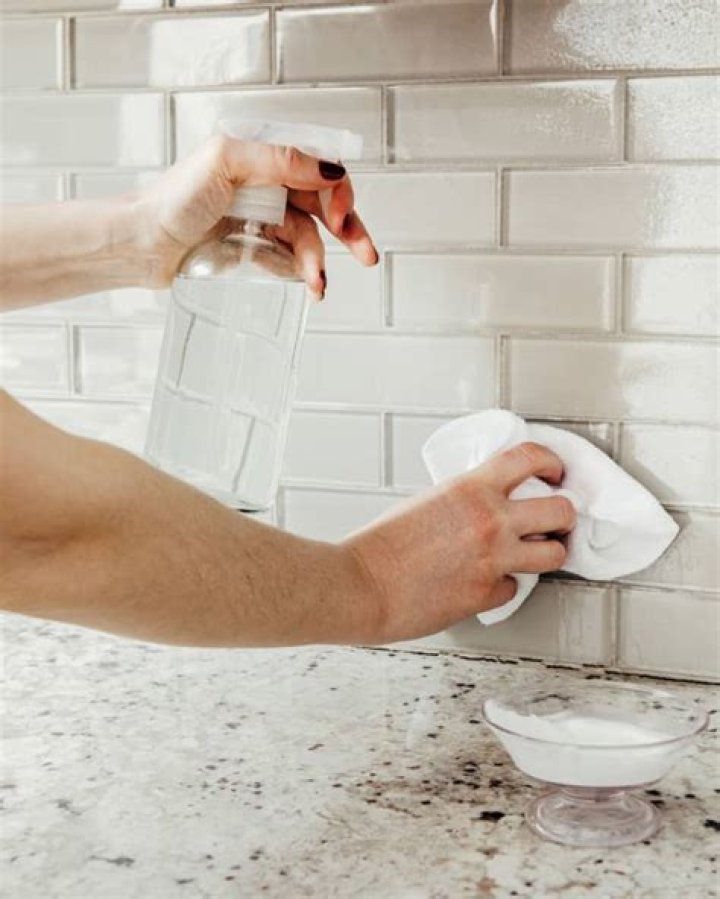 How do you remove grease from stainless steel backsplash?