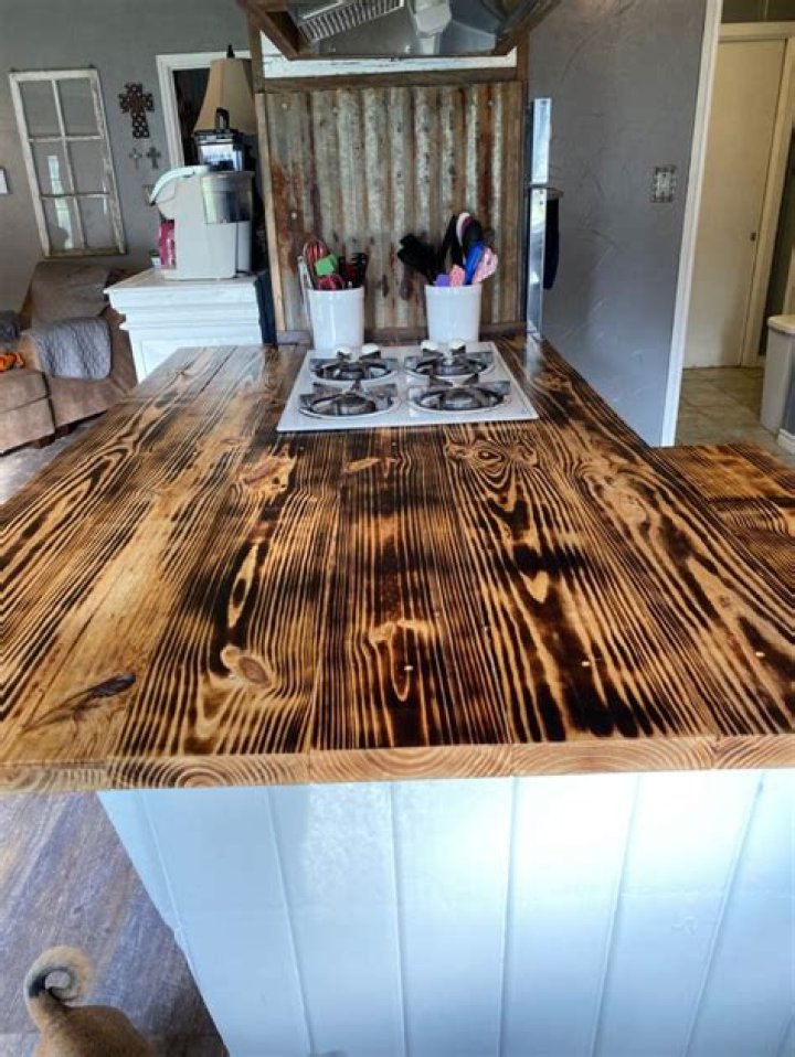How do you repair a burnt wood countertop?