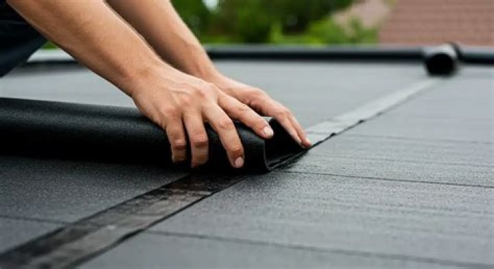 How do you repair a tear in a rubber roof?