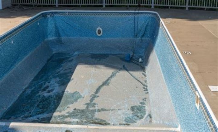 How do you repair a tear in a vinyl pool liner?