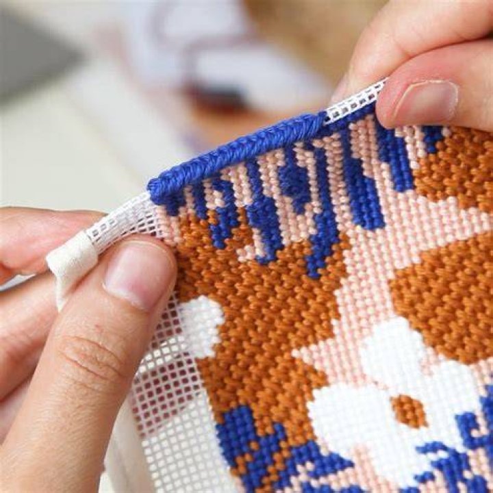 How do you stretch and block needlepoint?