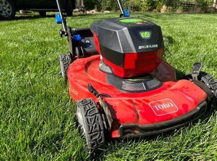 How do you turn on a electric lawn mower?