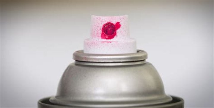 How do you unclog a spray can of texture?