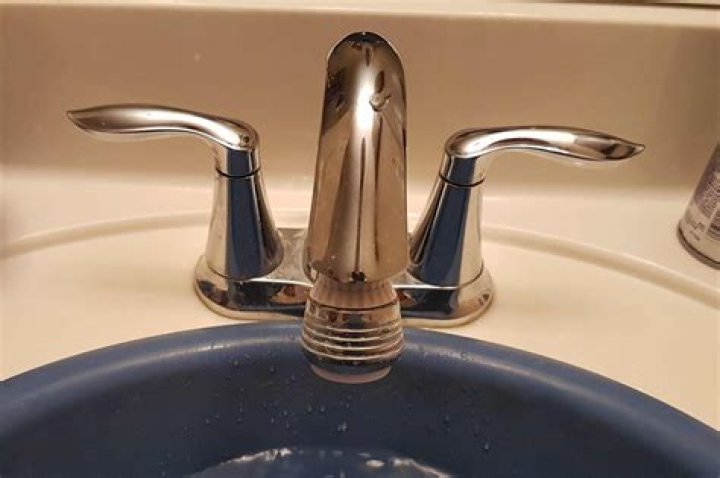 How do you unscrew a sink faucet?