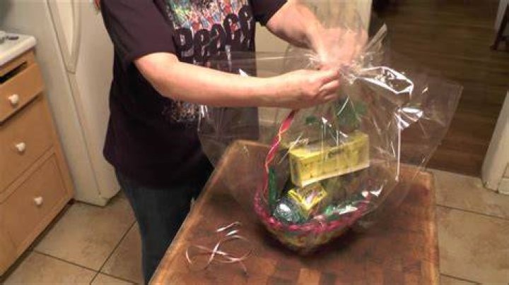 How do you wrap a large gift basket with cellophane?