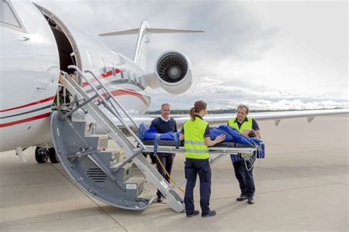 How is a dead body transported by plane?