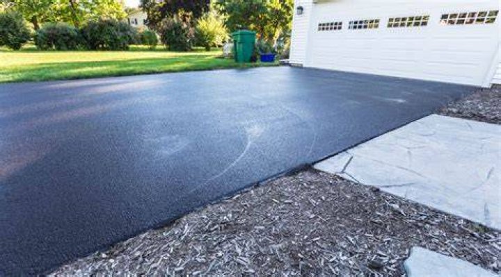 How long do you have to stay off of a sealed driveway?