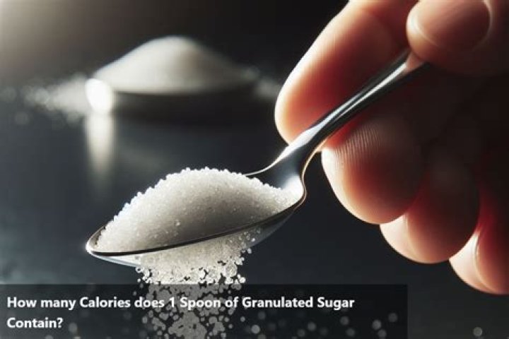 How many calories does a spoon of white sugar have?