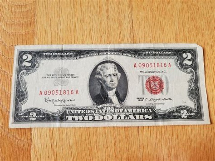 How much is a 2 dollar bill with red ink worth?
