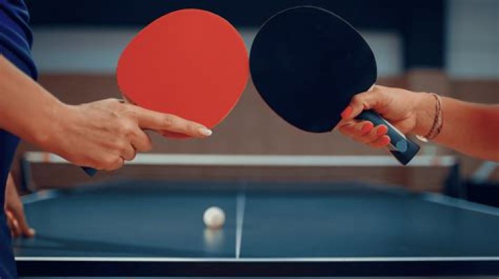 Is ping pong played on a table?