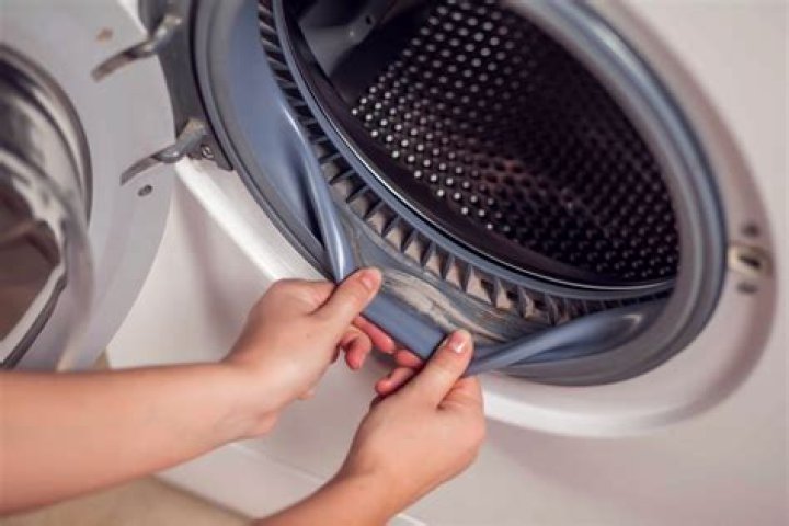 What can I use to clean my HE washer?