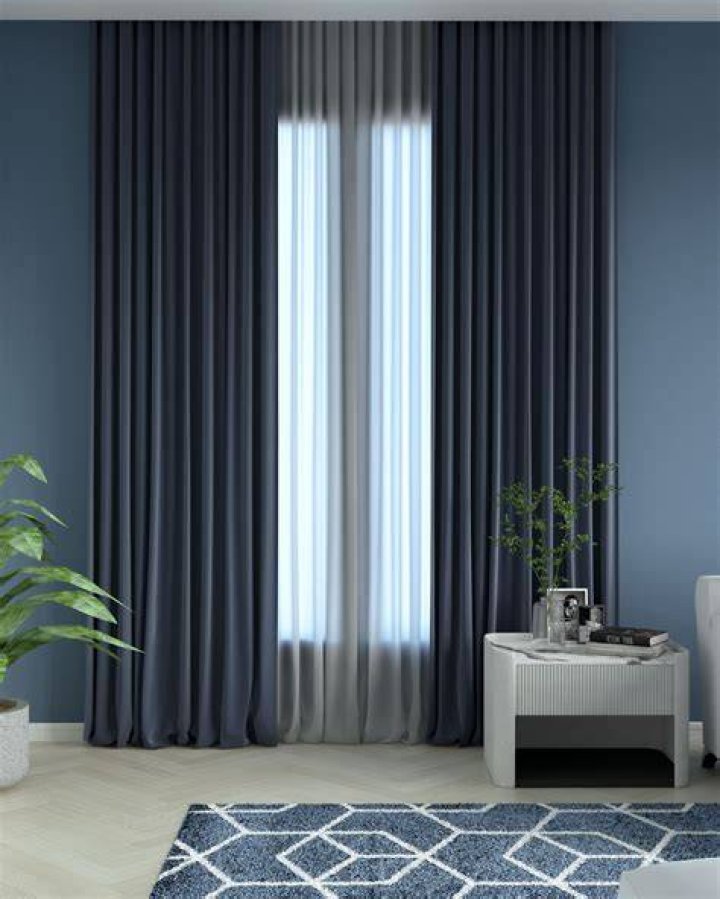 What color curtains go with navy blue walls?
