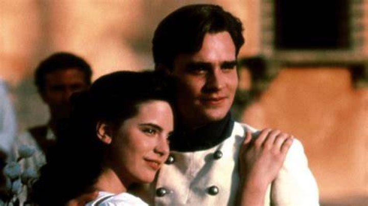 What do Claudio and Don Pedro say is a sign that Benedick is in love?