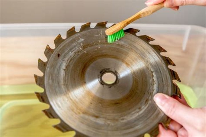 What do you use to clean a saw blade?