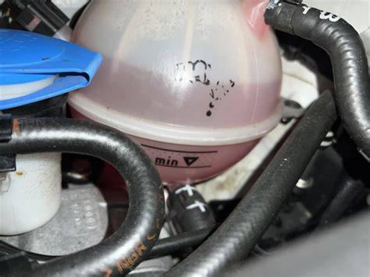 What happens if you put too much coolant in the reservoir?