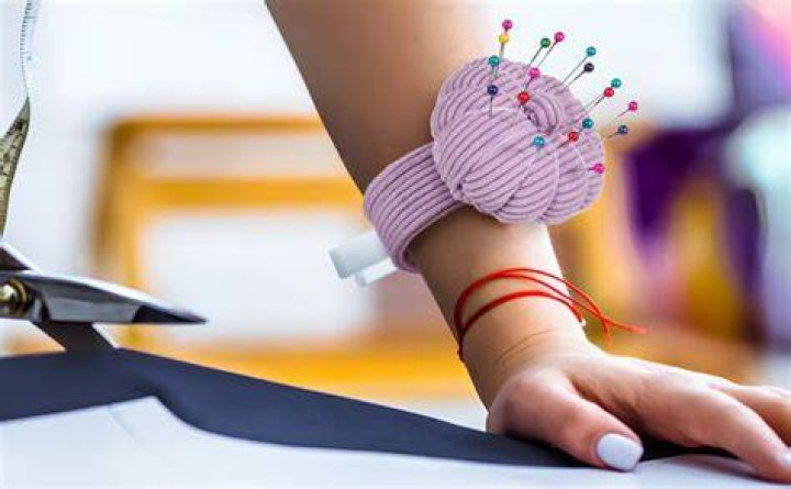 What holds the wrist pin in place?
