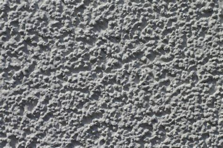 What is sand faced plaster?
