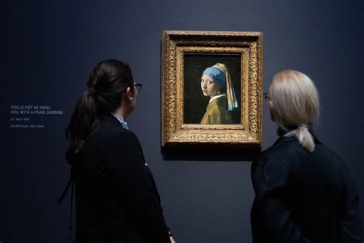 What is the name of the museum with the four rare and precious painting created by the artist Vermeer?