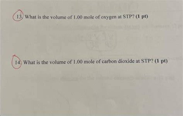 What is the volume of one mole of oxygen at STP?